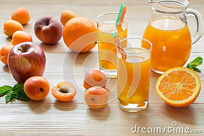 Apricot peach apple orange juice with ice. Stock Photo