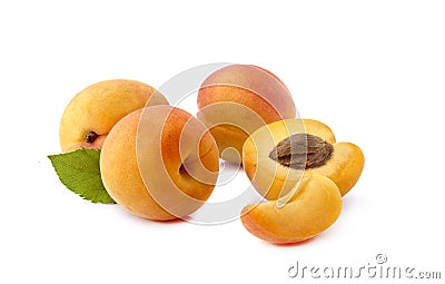 Apricots with leaf on white background closeup Stock Photo