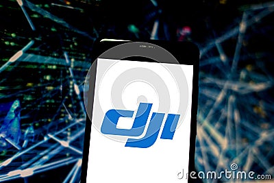 April 15, 2019, Brazil. DJI logo on the mobile device. DJI is a Chinese technology company, known for manufacturing drones Editorial Stock Photo