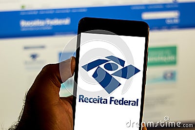 Logo of the Receita Federal do Brasil in the mobile device. Concept of income tax, economy, interest, taxes Editorial Stock Photo