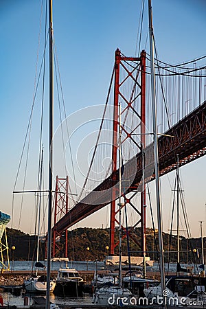 25 april bridge at sunset lisbon portugal. Photo of 25 april bridge at sunset Stock Photo