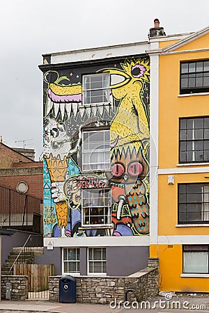April 2014 - Bristol, United Kingdom: A graffiti on the front facade of house Editorial Stock Photo