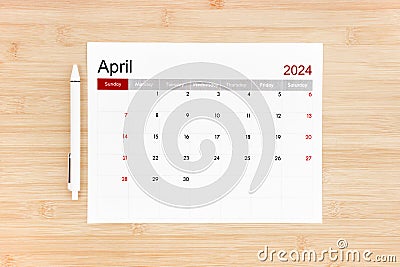 April 2024 calendar page on wooden Stock Photo