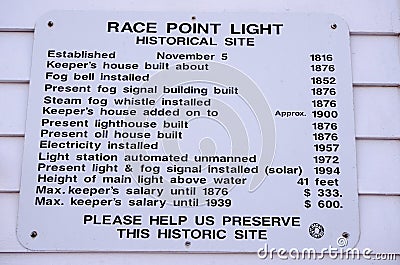 Sign giving information on Race Point Lighthouse on Cape Cod National Seashore Editorial Stock Photo