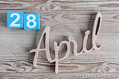 April 28th. Day 28 of month, daily calendar on wooden table background. Spring time theme Stock Photo