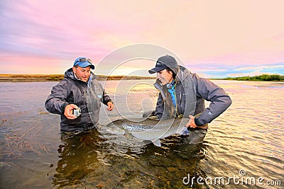 April Vokey releases a 20lb Seatrout Editorial Stock Photo