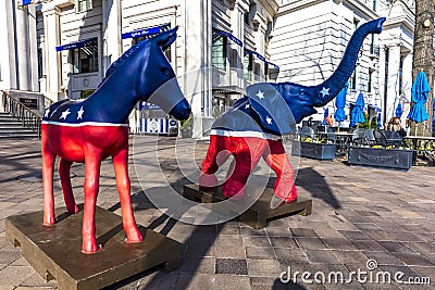 APRIL 11, 2018 - WASHINGTON DC - Democratic Mule and Republican Elephant statues symbolize. Republican, united Editorial Stock Photo