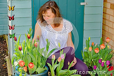 Tulips, butterfies and Adele's natural beauty. Stock Photo