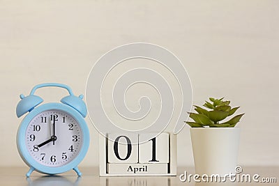 April 1 on a wooden white calendar. April 1 on a light background. Spring day. World laughter day Stock Photo