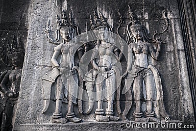 Apsara carvings status on the wall of Angkor temple, world herit Stock Photo