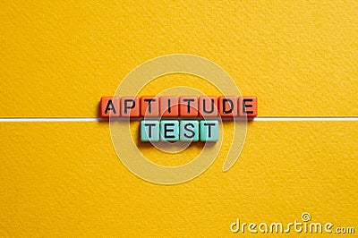 Aptitude test - word concept on cubes, text Stock Photo