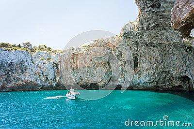 Apulia, Grotta Zinzulusa - A motorboat at the famous grotto of Z Stock Photo