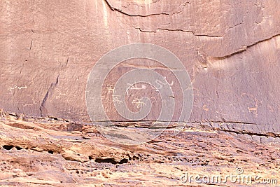 Fragment of surviving rock inscriptions left over from ancient times on a rock in the Wadi Rum desert near Aqaba city in Jordan Editorial Stock Photo