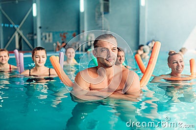 Aqua aerobics traninig, women group, male trainer Stock Photo