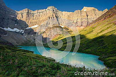 Aqua Waters of Cracker Lake in Montana Stock Photo