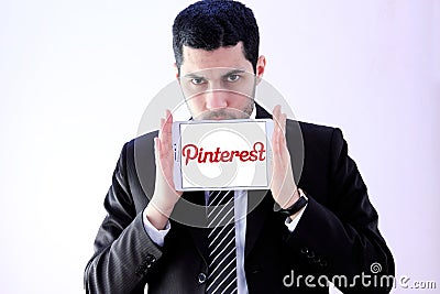 Arab business man with pinterest logo Editorial Stock Photo