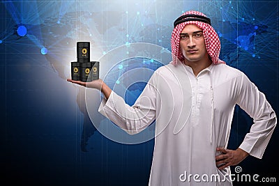 The arab businessman supporting oil price Stock Photo