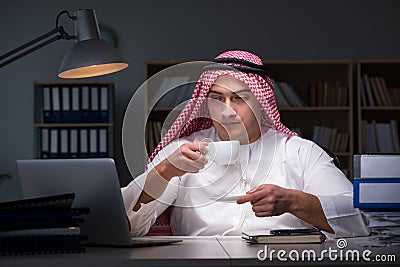 The arab businessman working late in office Stock Photo