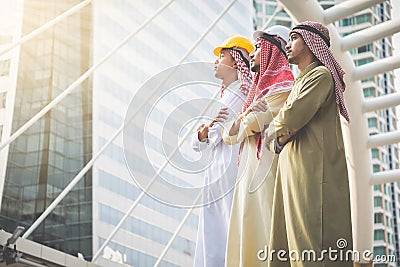 Arab businessmen and architects stand confident in their success Stock Photo