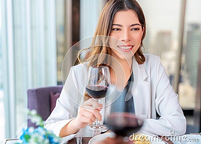 Arab couple lover dating and take a linch in Italian restaurant Stock Photo