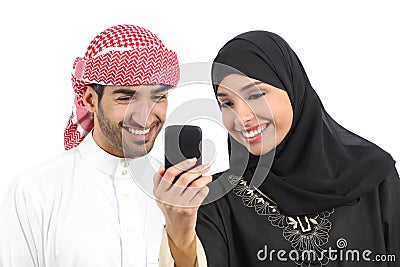 Arab couple sharing social media on the smart phone Stock Photo