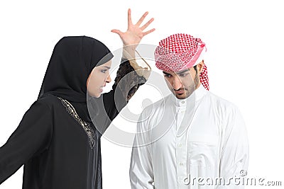 Arab couple with a woman arguing to her husband Stock Photo