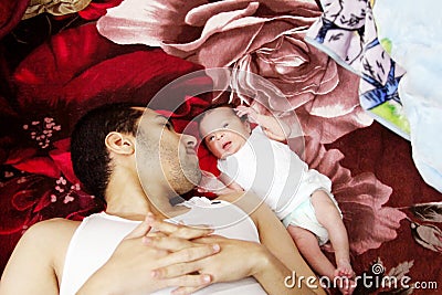 Arab egyptian man with his newborn baby girl Stock Photo