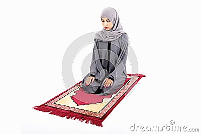 Arab muslim woman praying Stock Photo