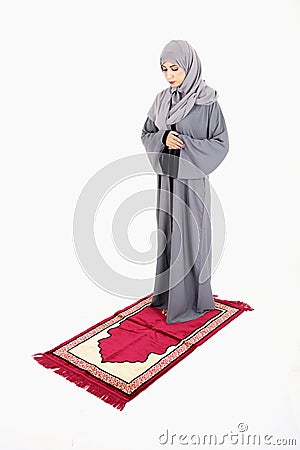 Arab muslim woman praying Stock Photo