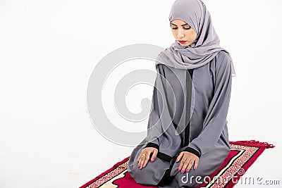 Arab muslim woman praying Stock Photo