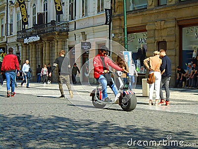Arab on segway in the city Prague Editorial Stock Photo