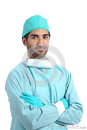 Arab surgeon serious doctor posing standing with folded arms Stock Photo