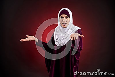 Arab woman in hijab expresses outrage Stock Photo