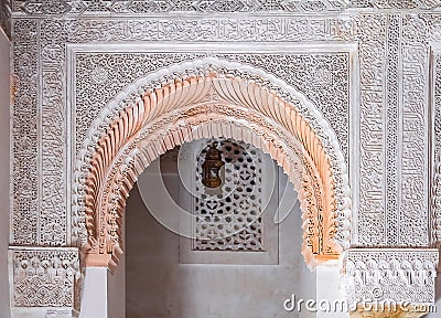 Arabesque carved plaster above an archway in a Moroccan medersa Editorial Stock Photo