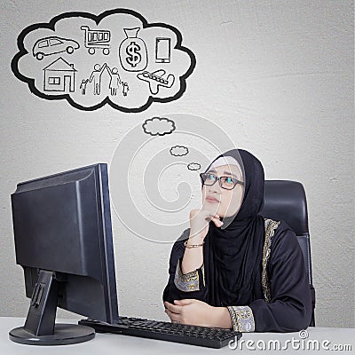 Arabian businesswoman thinking her dream Stock Photo