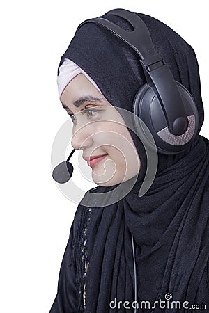 Arabian employee with headphones Stock Photo