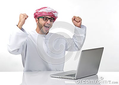 Arabian excited businessman expressing success Stock Photo