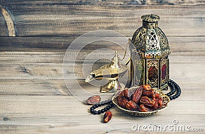 Arabian lantern, golden lamp fruits. Eid mubarak vintage Stock Photo