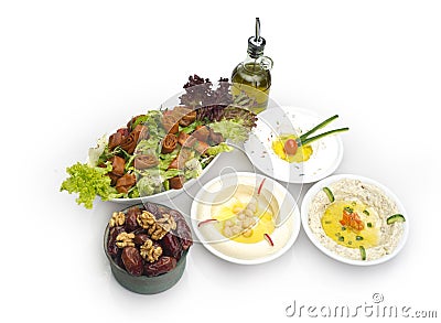 Arabic food of Hommos, Labneh,Fattoush, & Dates Stock Photo