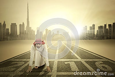 Arabic man with numbers 2016 on street Stock Photo