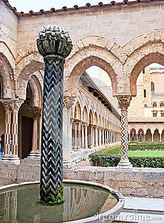 The Arabic in Monreale Cloister's garden Stock Photo