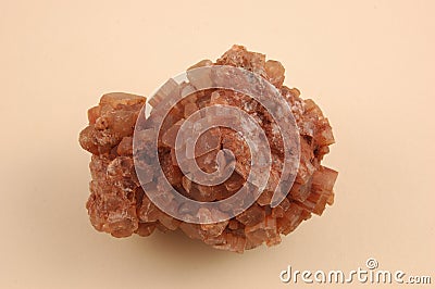 Aragonite-raw on a Pink Background. Stock Photo