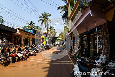 Arambol, Goa, Iindia - March 22, 2017: Street shops of sale of souvenirs and clothes for tourists in the Arambol village Editorial Stock Photo