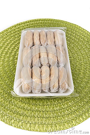 Araro arrowroot fragile wrapped cookies traditional snack treat philippines Stock Photo