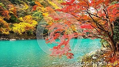 Arashiyama in autumn season along the river in Kyoto, Japan Stock Photo