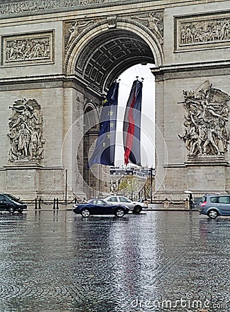 Arc de triomphe and car traffic, rainy day, Paris, France Editorial Stock Photo