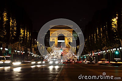 Arc de Triomphe at night Stock Photo