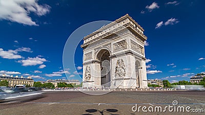 The Arc de Triomphe Triumphal Arch of the Star timelapse is one of the most famous monuments in Paris Stock Photo