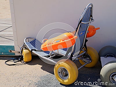 Mobi-chair beach chair for people disabled person with reduced mobility in sandy Editorial Stock Photo