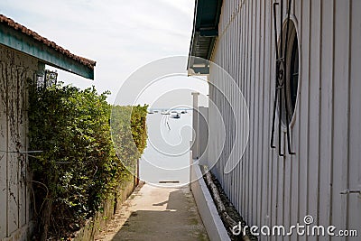 Arcachon Bay in France oyster beach houses alley in village of L`Herbe lege Cap Ferret Stock Photo